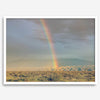 Desert landscape artwork of a rainbow over Arizona sand dunes with distant mountains.
