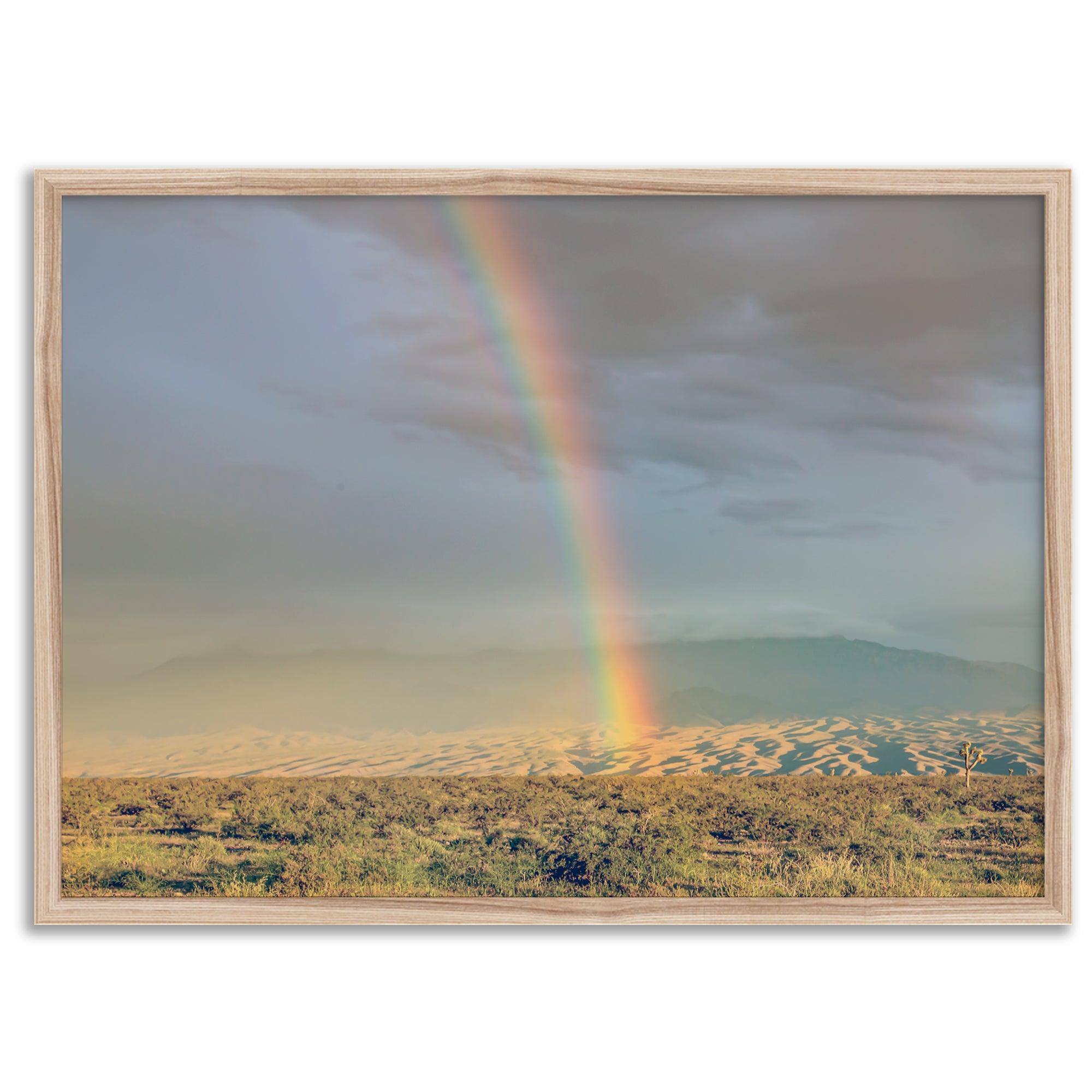 Desert landscape artwork of a rainbow over Arizona sand dunes with distant mountains