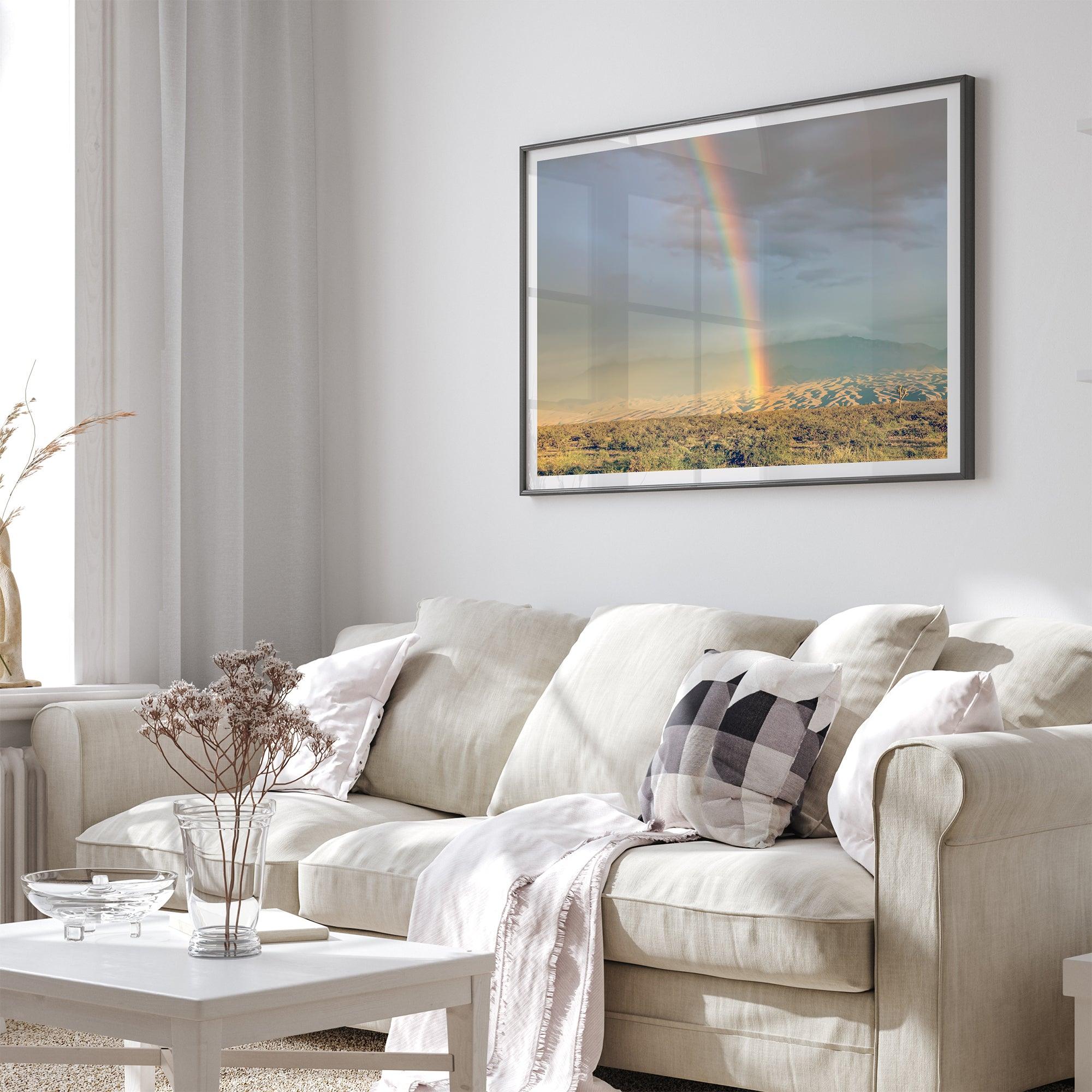 Desert landscape artwork of a rainbow over Arizona sand dunes with distant mountains