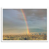 Desert landscape artwork of a rainbow over Arizona sand dunes with distant mountains