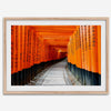Framed photograph of the Fushimi Inari Torii Gates in Kyoto, Japan, showcasing vibrant vermilion gates.