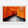 Framed photograph of the Fushimi Inari Torii Gates in Kyoto, Japan, showcasing vibrant vermilion gates.