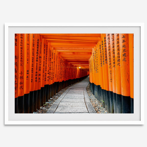 Framed photograph of the Fushimi Inari Torii Gates in Kyoto, Japan, showcasing vibrant vermilion gates.