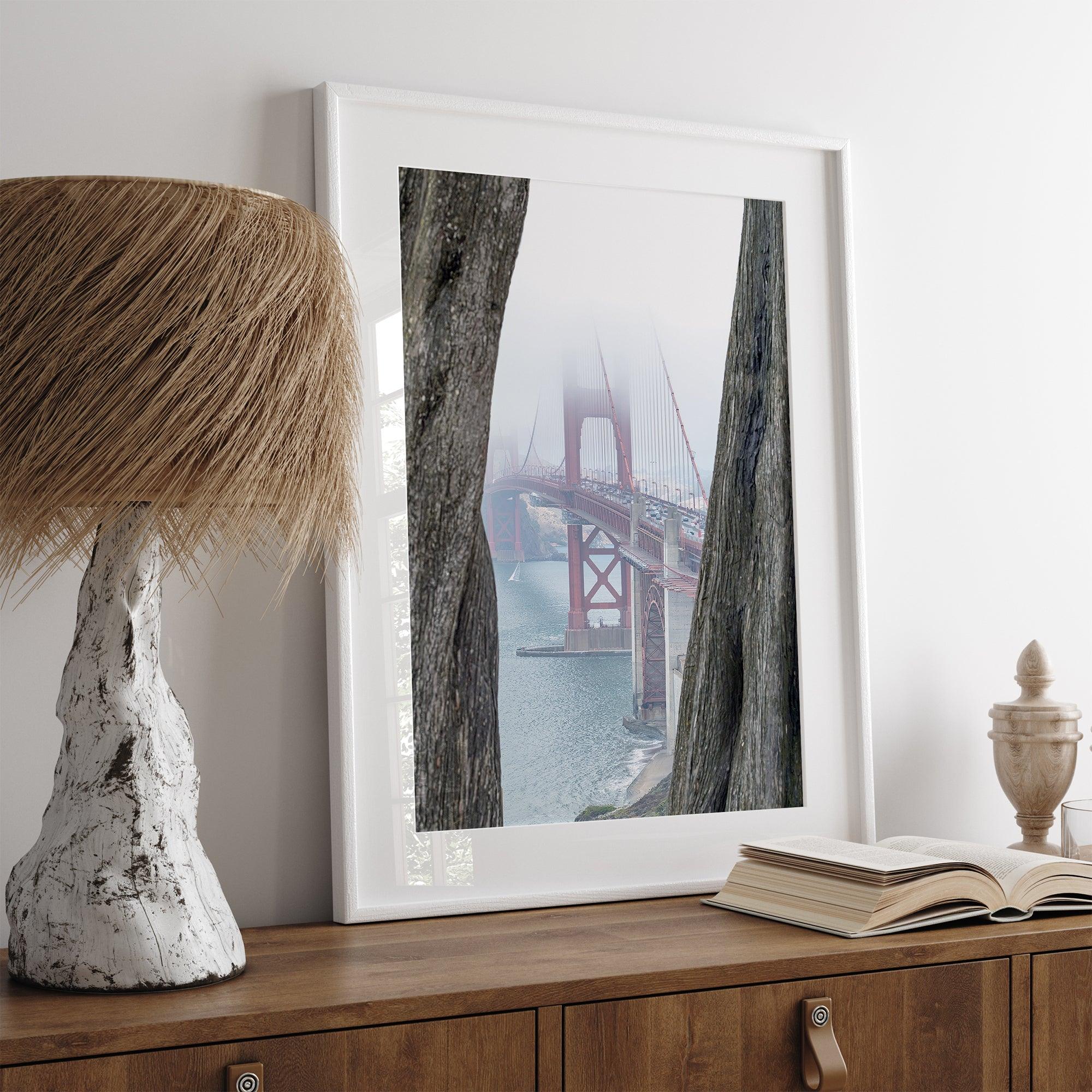 Foggy Golden Gate Bridge framed by cypress trees, San Francisco landscape photography