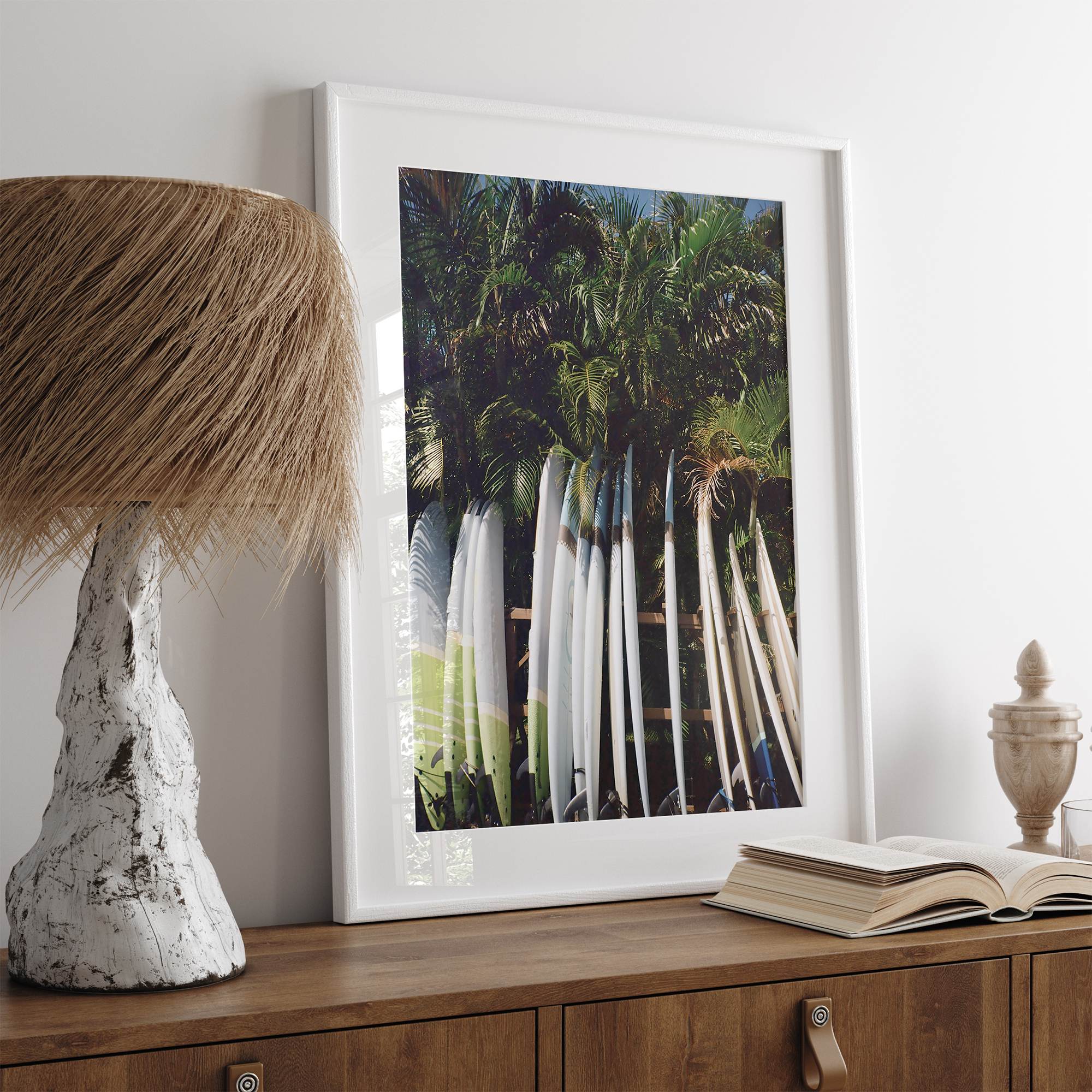 Rows of longboards under palm trees in Hawaii, tropical surfboard wall art photograph.
