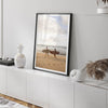 Framed surfers on beach art print featuring Hawaiian coastline and calm morning tones