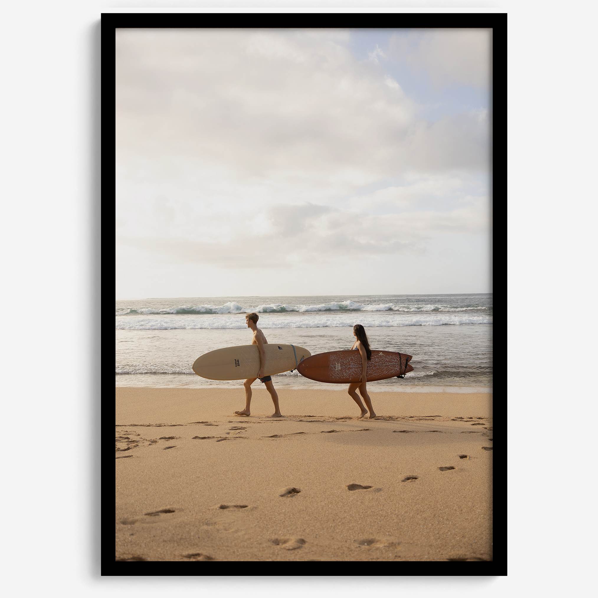 Framed surfers on beach art print featuring Hawaiian coastline and calm morning tones