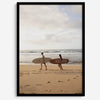 Framed surfers on beach art print featuring Hawaiian coastline and calm morning tones