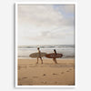 Framed surfers on beach art print featuring Hawaiian coastline and calm morning tones