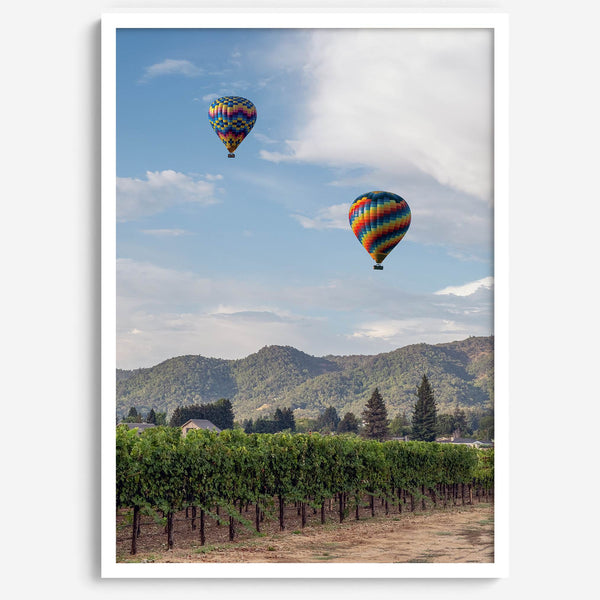 Fine art hot air balloon photography print above Napa Valley vineyards in Yountville.