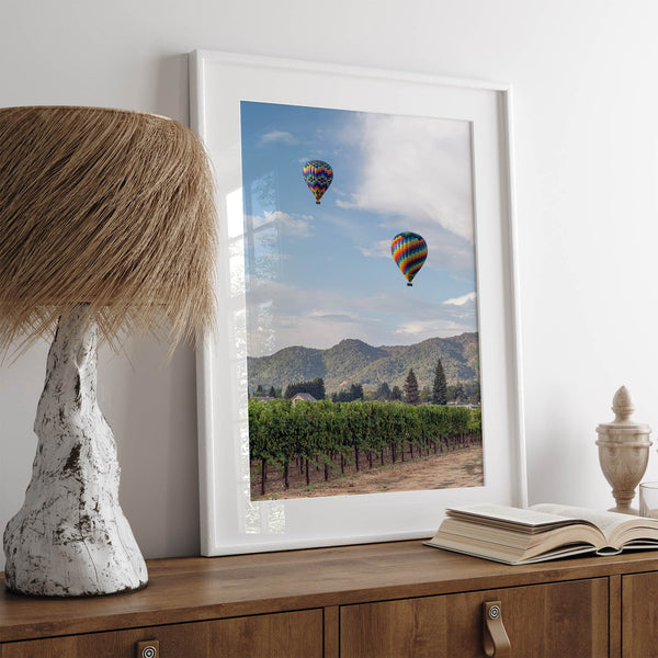 Fine art hot air balloon photography print above Napa Valley vineyards in Yountville.