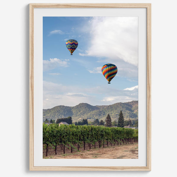 Fine art hot air balloon photography print above Napa Valley vineyards in Yountville.