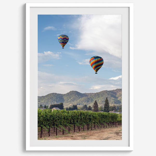 Fine art hot air balloon photography print above Napa Valley vineyards in Yountville.