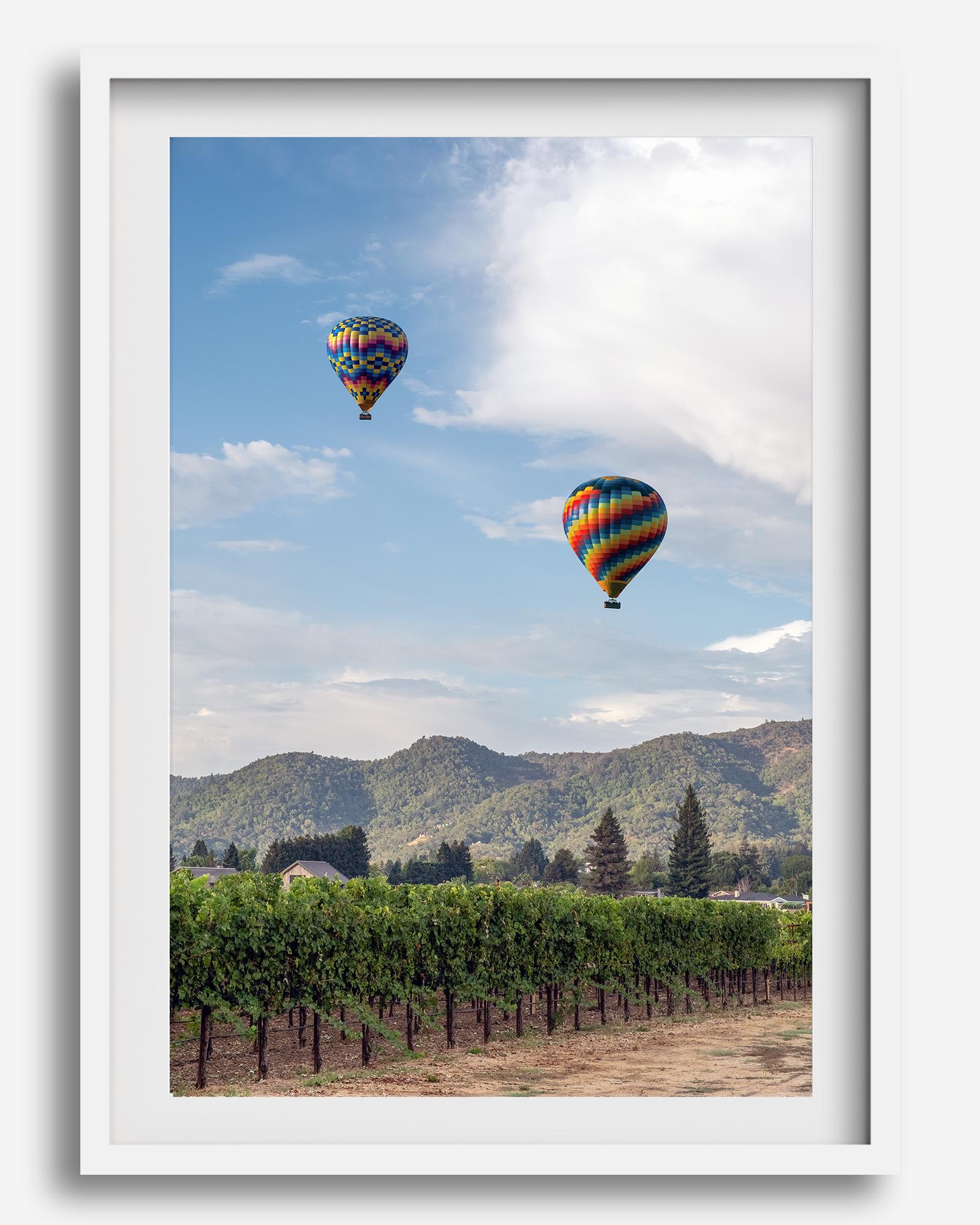 Fine art hot air balloon photography print above Napa Valley vineyards in Yountville.