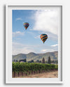 Fine art hot air balloon photography print above Napa Valley vineyards in Yountville.