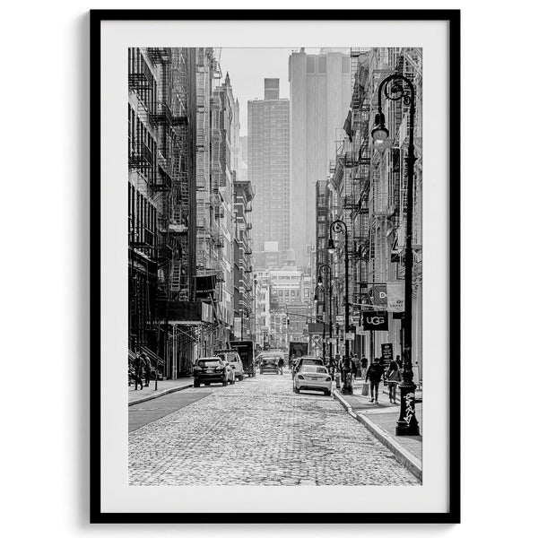 A fine art vertical photography print of a bustling NYC street with unique NYC architecture and fire escape stairs.