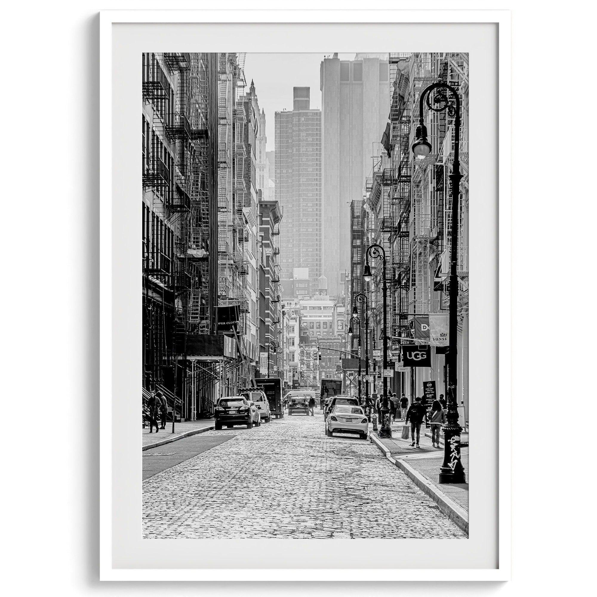 A fine art vertical photography print of a bustling NYC street with unique NYC architecture and fire escape stairs.