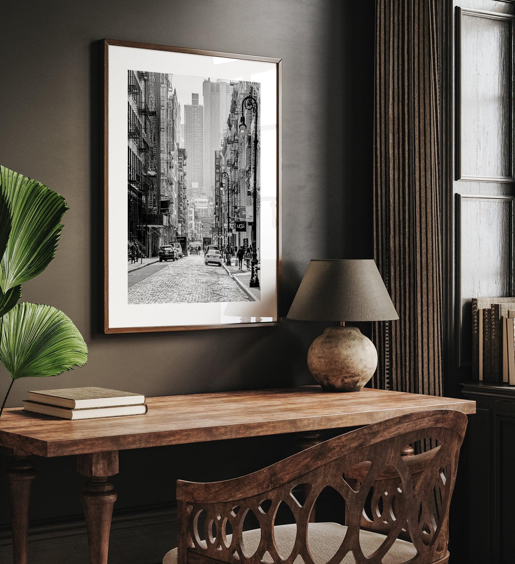 A fine art vertical photography print of a bustling NYC street with unique NYC architecture and fire escape stairs.