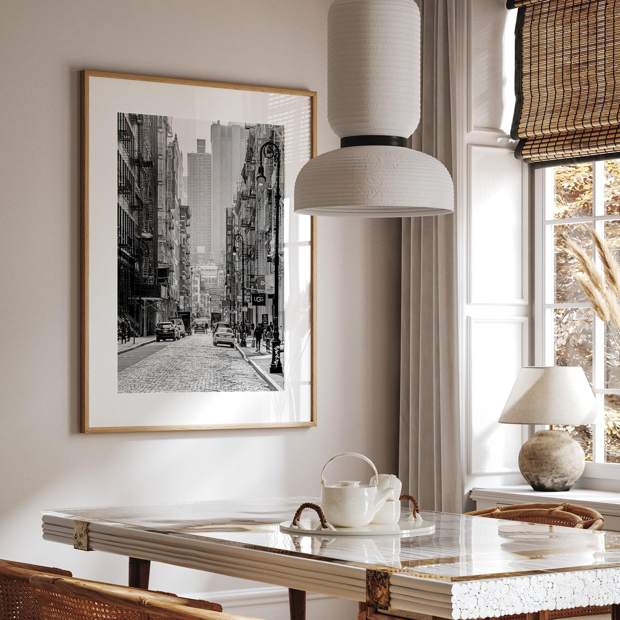 A fine art vertical photography print of a bustling NYC street with unique NYC architecture and fire escape stairs.