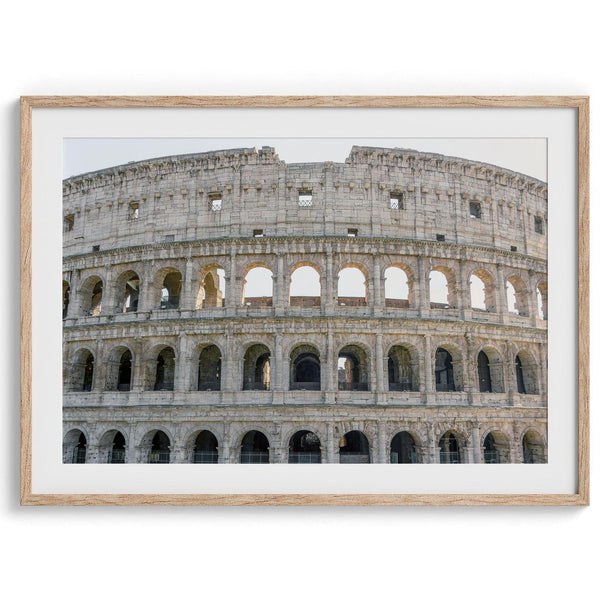 A fine art photography print showing a close-up photo of the Colosseum in Rome, Italy, highlighting the intricate details of its ancient architecture
