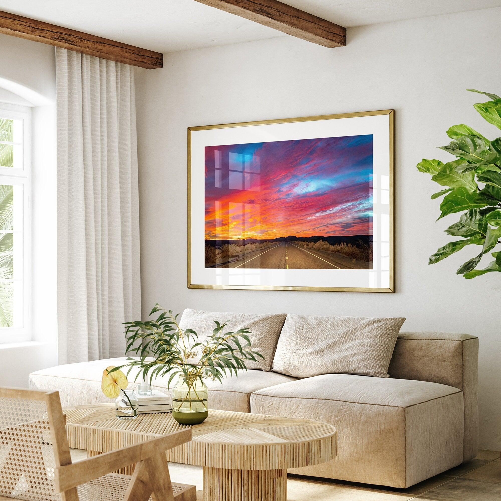 Mojave Desert Sunset Print - A captivating wall art featuring vibrant hues of a late desert sunset casting a warm glow over a timeless desert road. Perfect for desert enthusiasts and nature lovers."