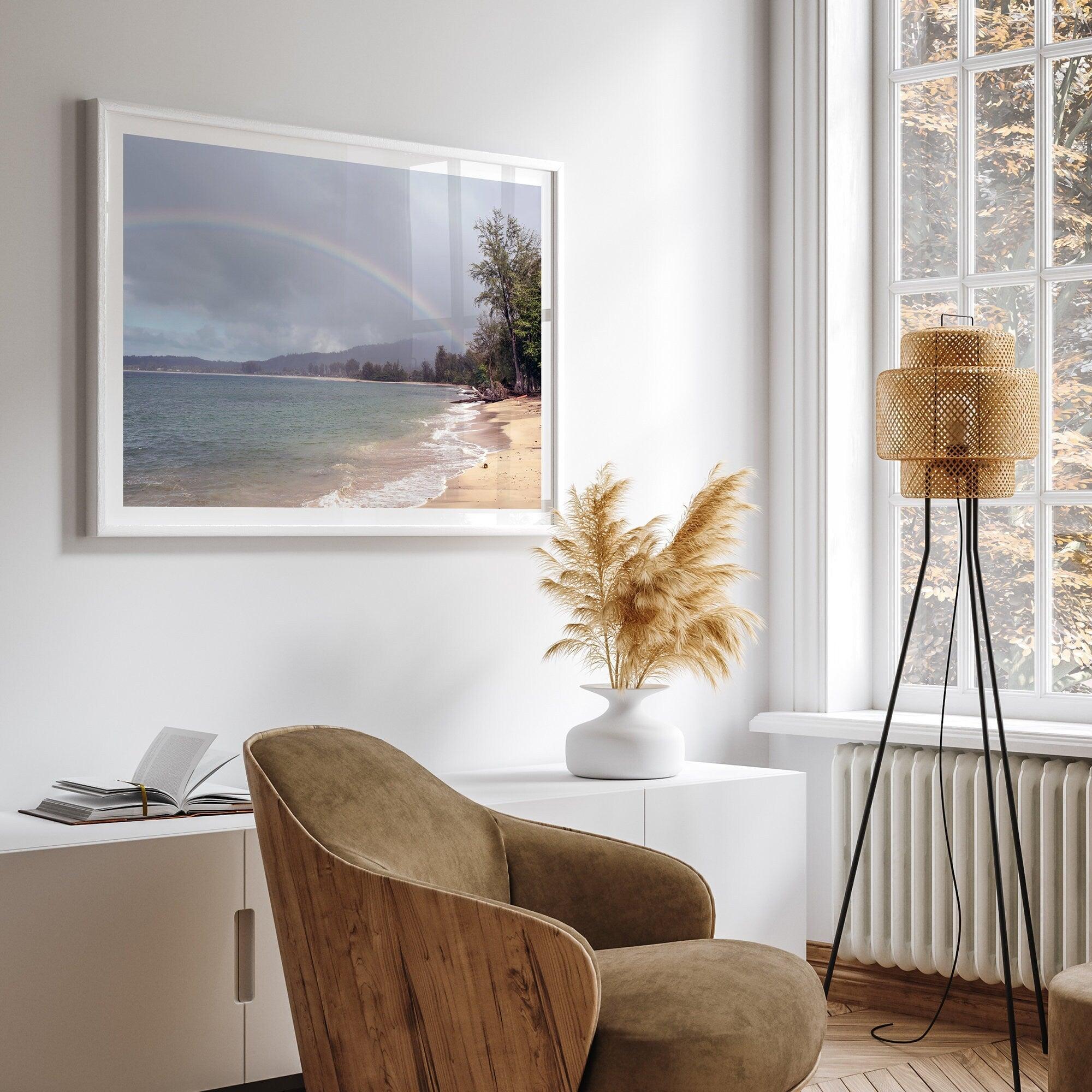 A framed or unframed beach fine art photography print showcasing a stunning tropical beach in Kauai, Hawai with a large breathtaking rainbow across it.