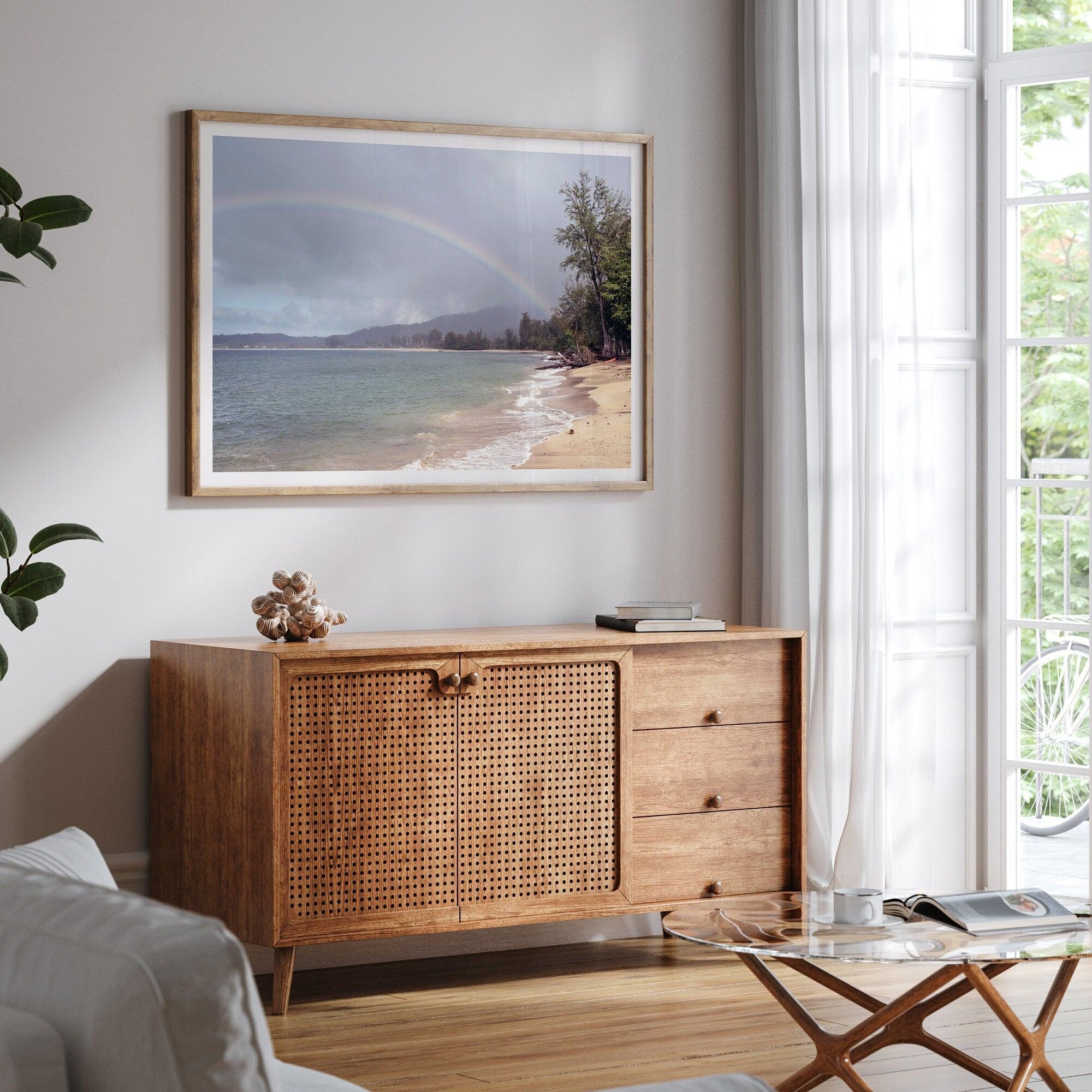 A framed or unframed beach fine art photography print showcasing a stunning tropical beach in Kauai, Hawai with a large breathtaking rainbow across it.