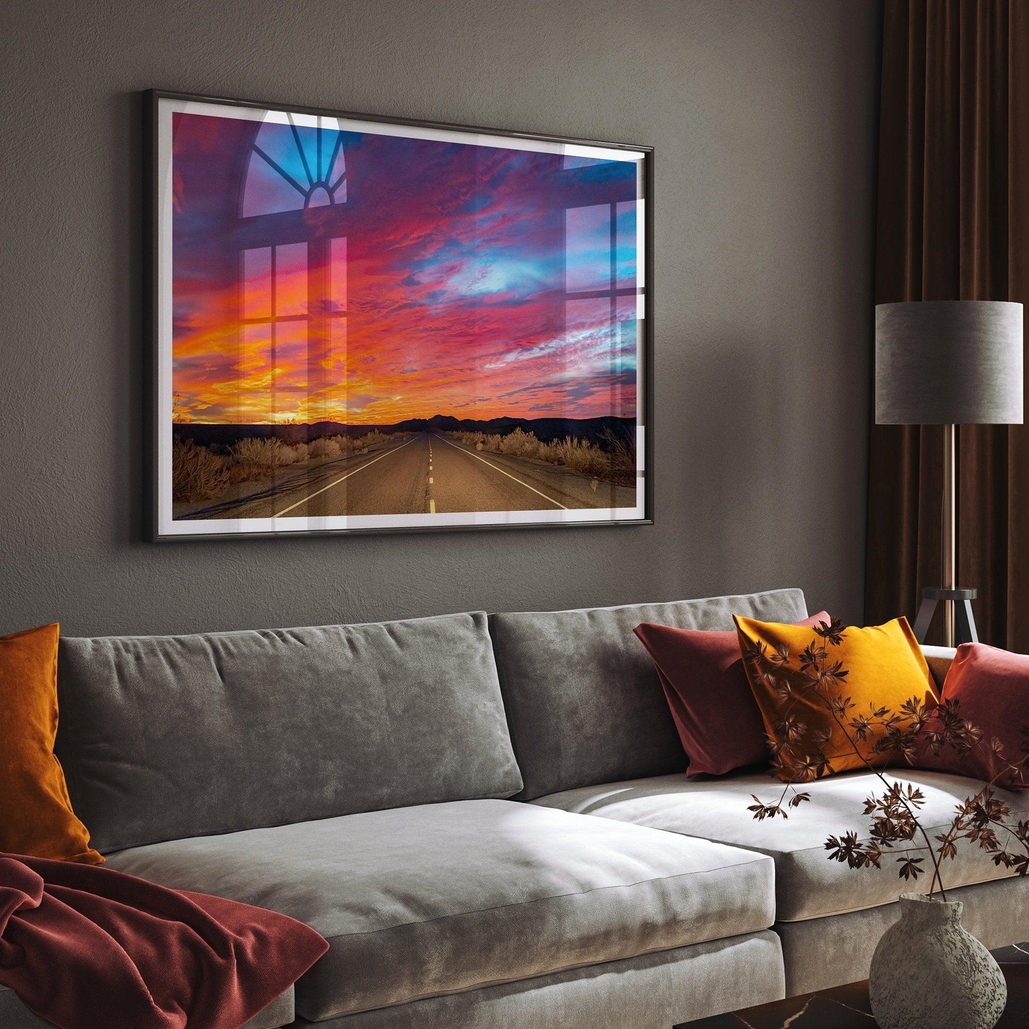 Mojave Desert Sunset Print - A captivating wall art featuring vibrant hues of a late desert sunset casting a warm glow over a timeless desert road. Perfect for desert enthusiasts and nature lovers."