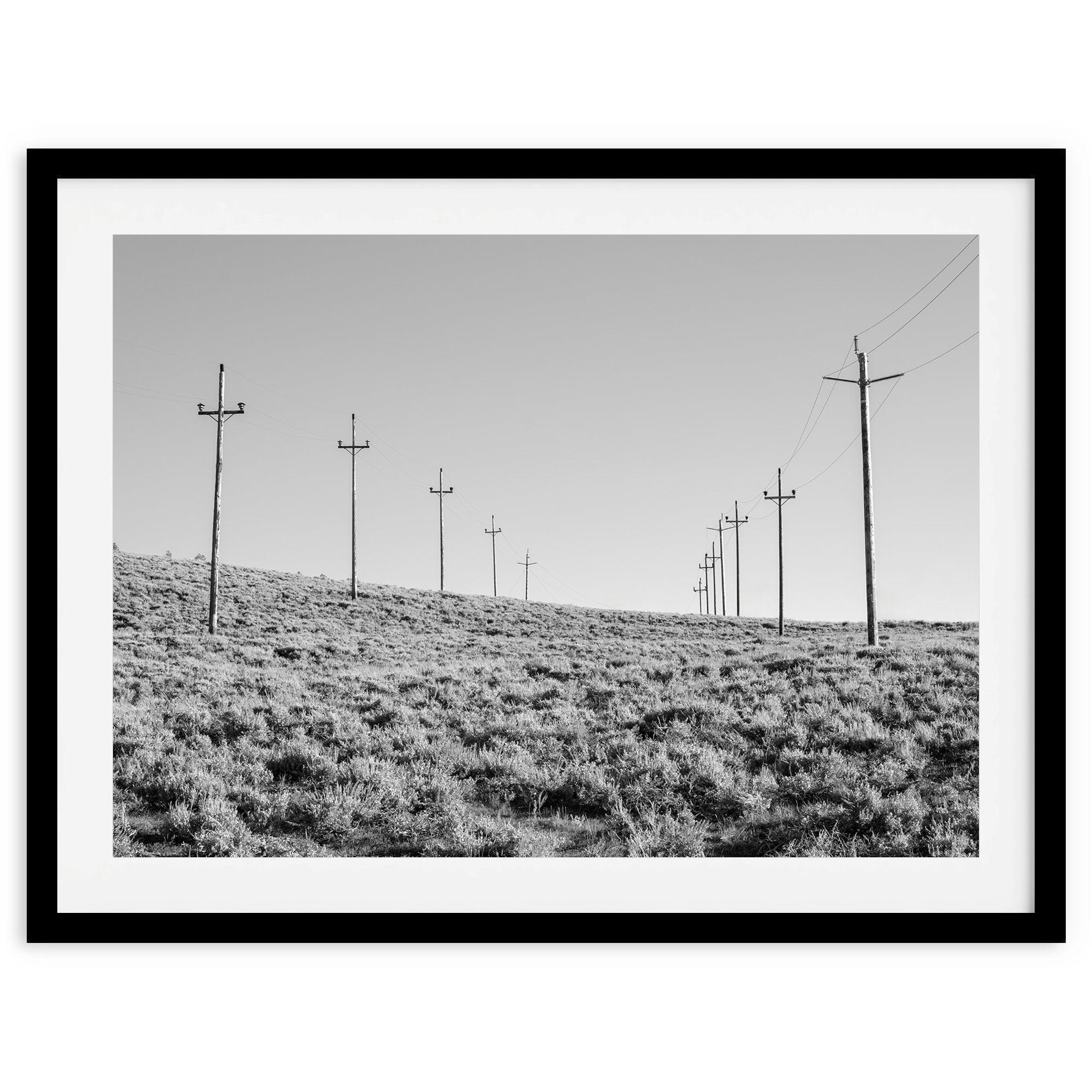 A black and white fine art photography print showcasing desert power lines in the Eastern Sierras in Americana decor style.