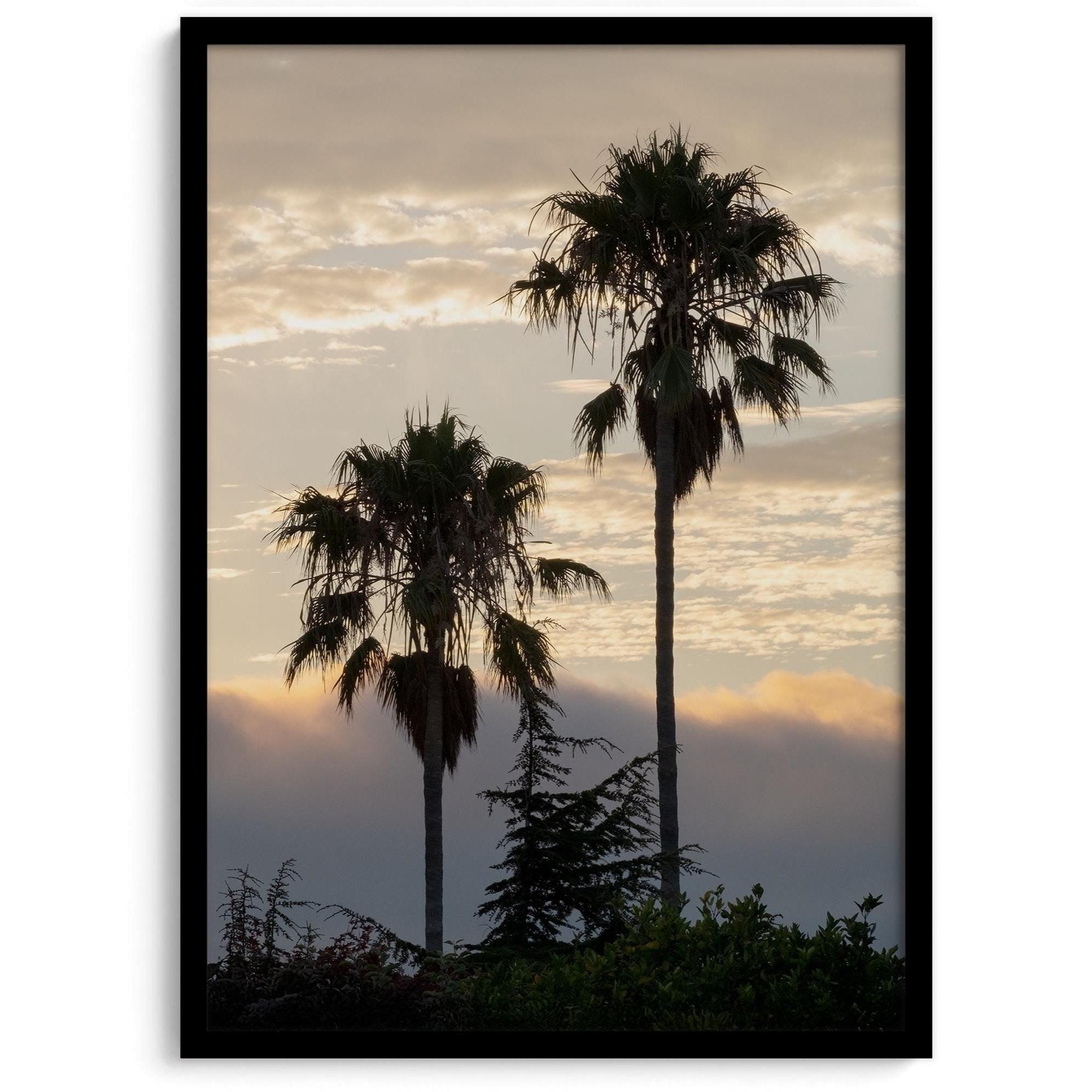 Palm tree wall art featuring two silhouetted palms at sunrise along a California beach.