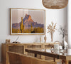 Framed photography print of an Arizona desert landscape with saguaro cacti and a sunlit mountain.