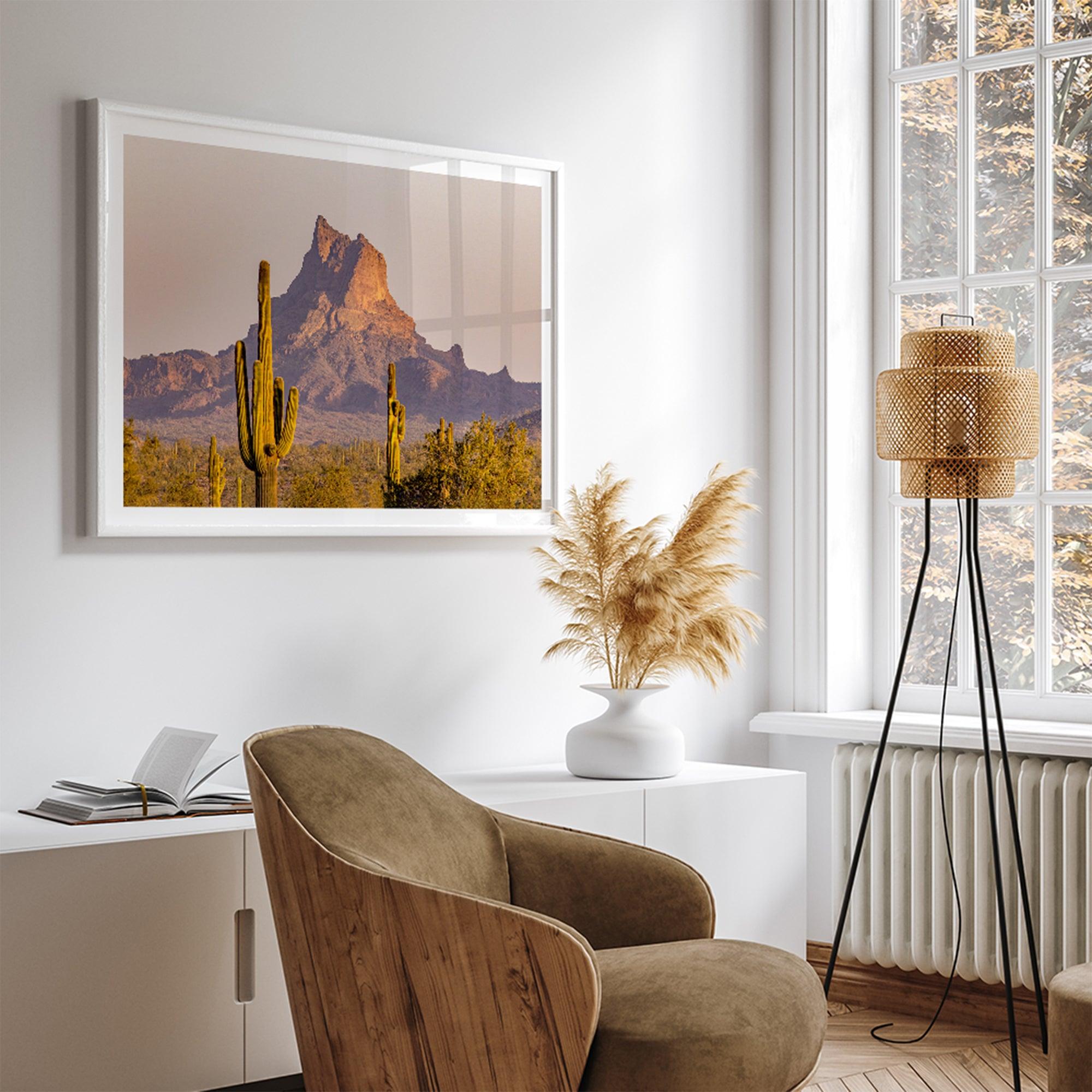 Framed photography print of an Arizona desert landscape with saguaro cacti and a sunlit mountain.