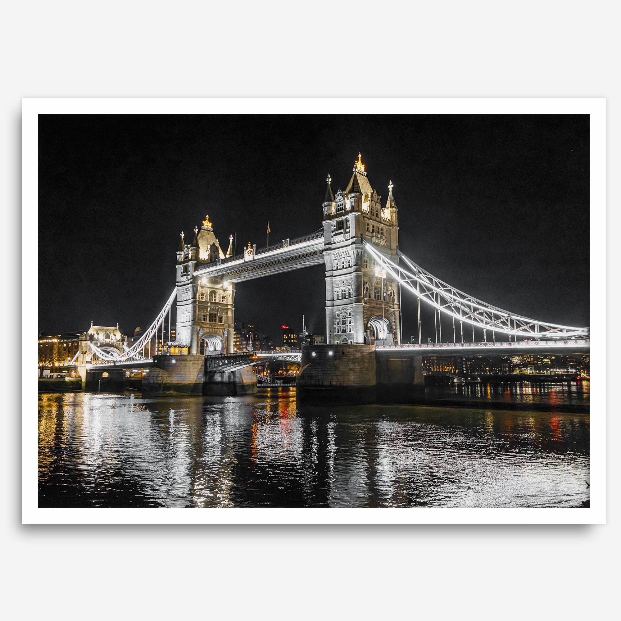 Night view of London’s Tower Bridge with glowing lights and water reflections, perfect london wall art print