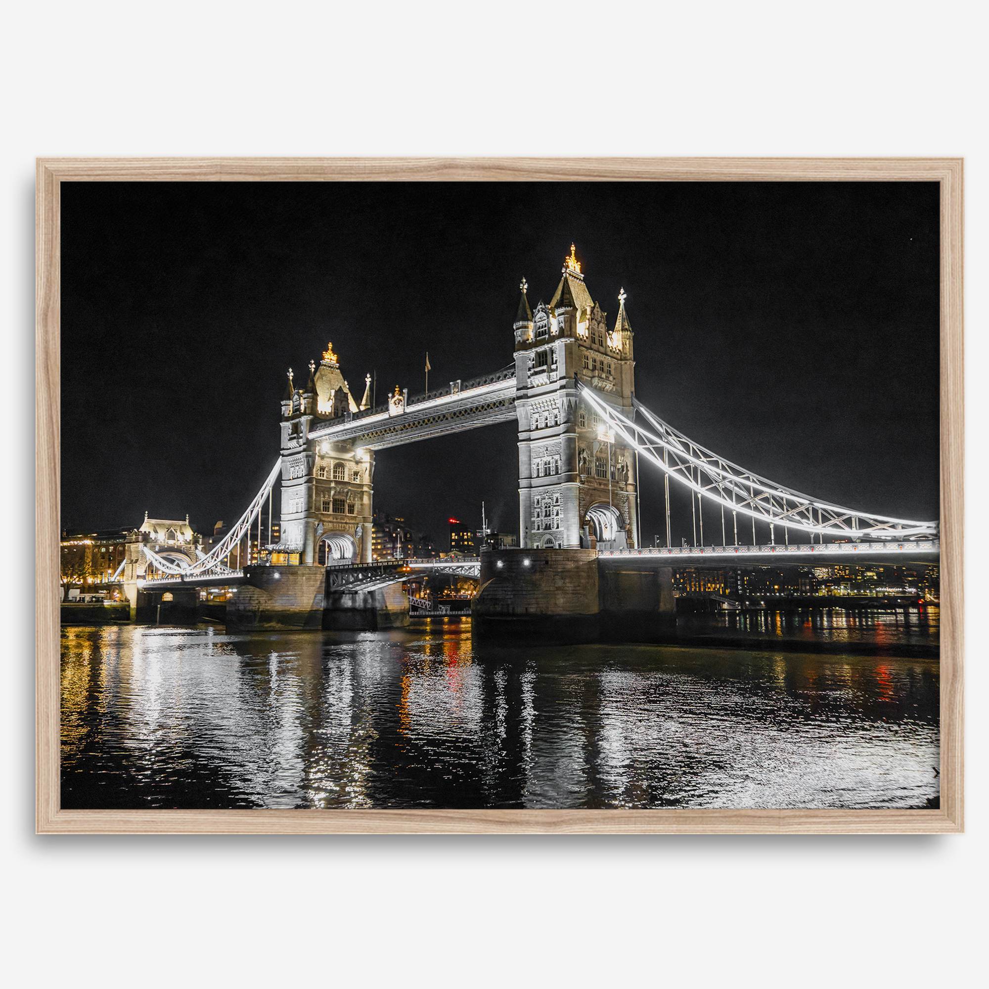 Night view of London’s Tower Bridge with glowing lights and water reflections, perfect london wall art print