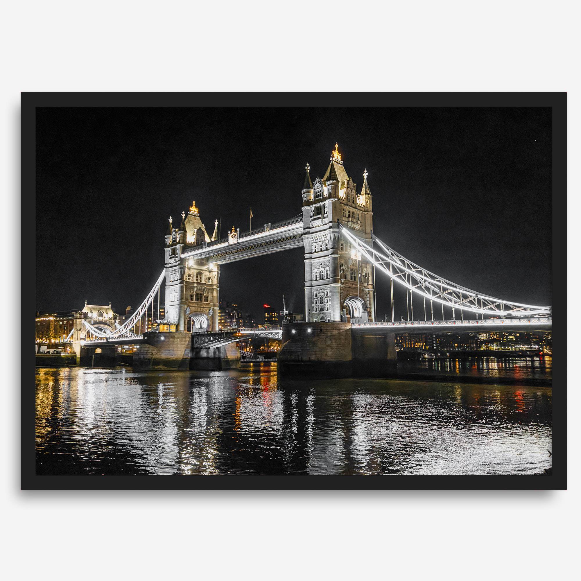 Night view of London’s Tower Bridge with glowing lights and water reflections, perfect london wall art print