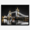Night view of London’s Tower Bridge with glowing lights and water reflections, perfect london wall art print