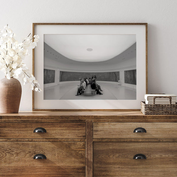 Framed fine art photography print of art lovers in Musée de l’Orangerie, admiring Claude Monet’s Water Lilies in an elliptical gallery.