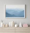 A fine art mountain photography print showing tens of shaded mountains one after the other. This minimalist mountain range wall art is perfect for nature lovers.