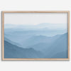 A fine art mountain photography print showing tens of shaded mountains one after the other. This minimalist mountain range wall art is perfect for nature lovers.