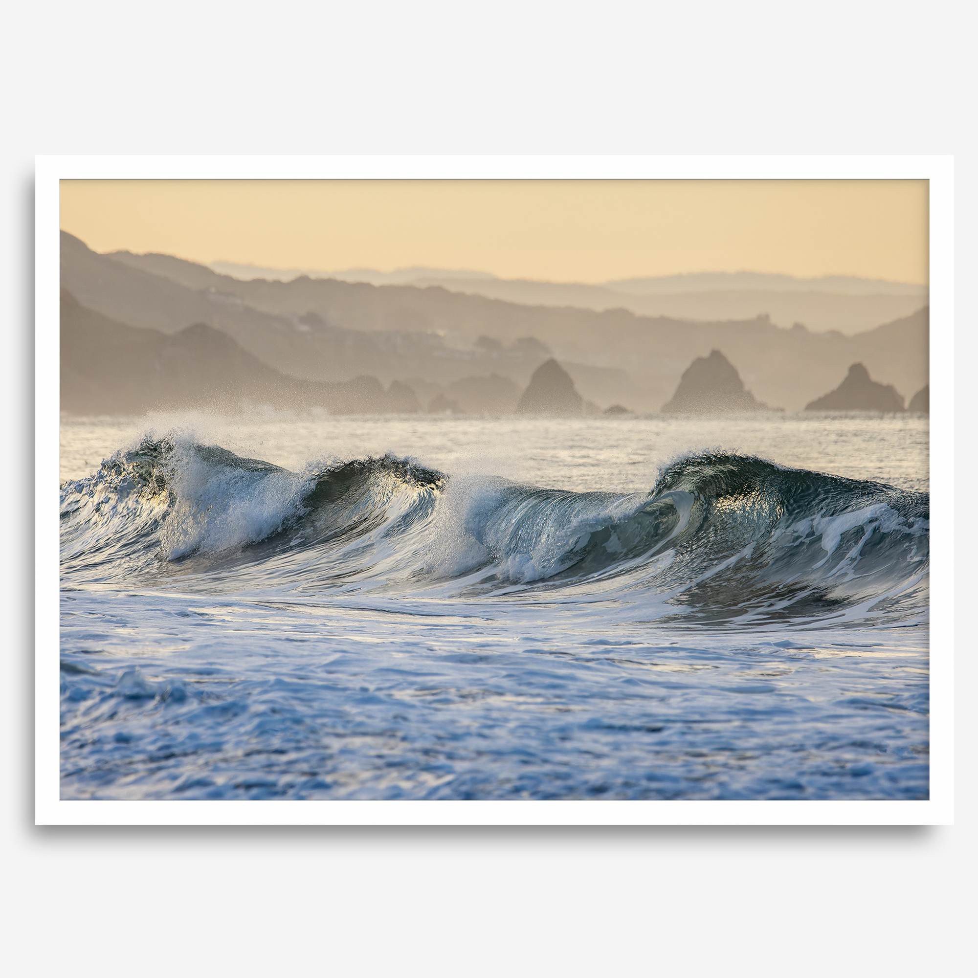 A fine art Ocean print showcasing water waves crashing in the ocean. this beach-themed wall art will make you want to jump into the waves every time you look at it. Taken in Bodega Bay, California.