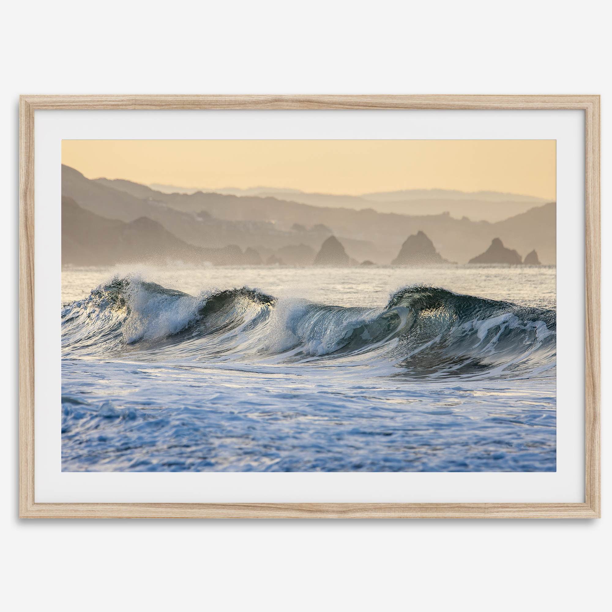 A fine art Ocean print showcasing water waves crashing in the ocean. this beach-themed wall art will make you want to jump into the waves every time you look at it. Taken in Bodega Bay, California.