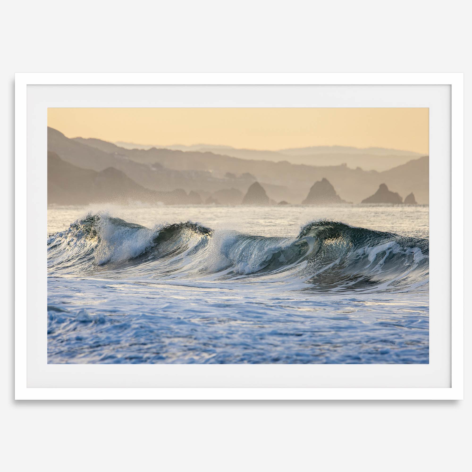 A fine art Ocean print showcasing water waves crashing in the ocean. this beach-themed wall art will make you want to jump into the waves every time you look at it. Taken in Bodega Bay, California.