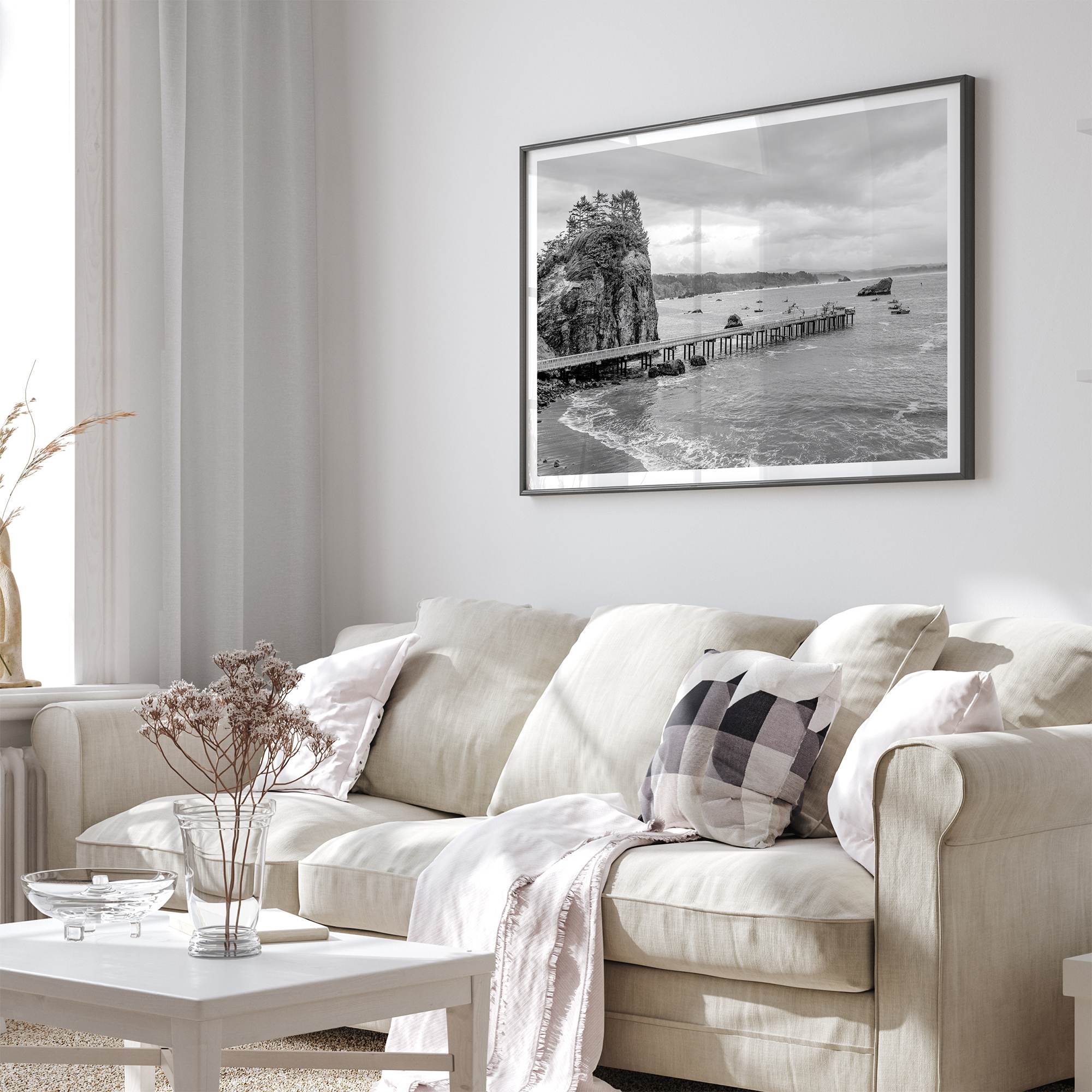 Scenic Pacific Northwest wall art of Trinidad State Park in California in black and white, showcasing a coastal pier, lush green cliffs, and calm ocean waves under cloudy skies.