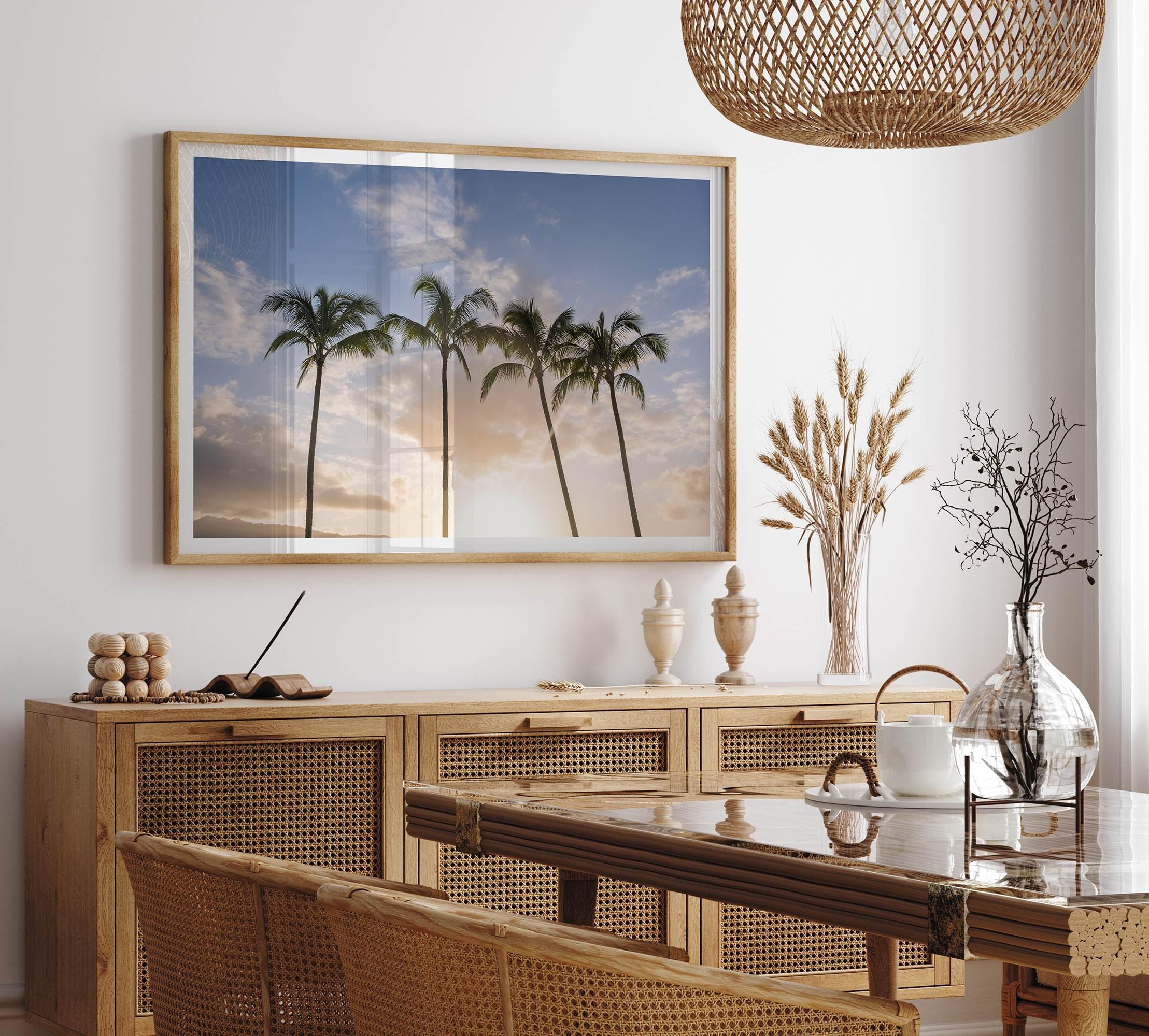 Palm tree artwork that shows a sunset over palm trees in Kauai with golden sky and tropical landscape for wall decor.