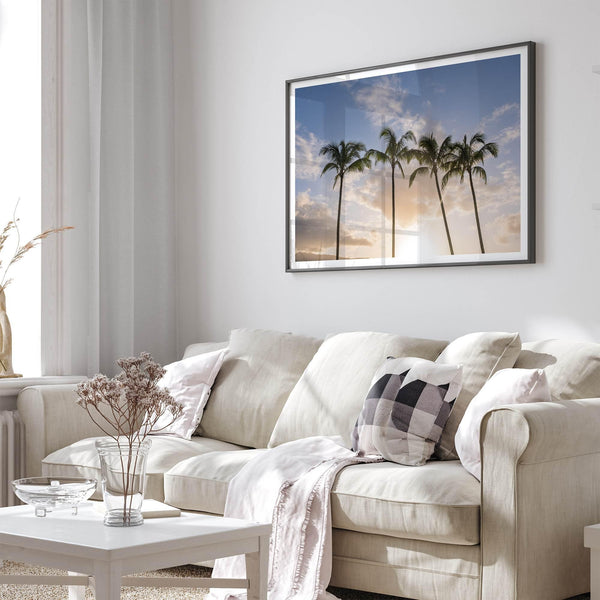 Palm tree artwork that shows a sunset over palm trees in Kauai with golden sky and tropical landscape for wall decor.