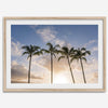 Palm tree artwork that shows a sunset over palm trees in Kauai with golden sky and tropical landscape for wall decor.