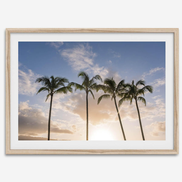 Palm tree artwork that shows a sunset over palm trees in Kauai with golden sky and tropical landscape for wall decor.