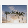 Palm tree artwork that shows a sunset over palm trees in Kauai with golden sky and tropical landscape for wall decor.