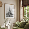 Black-and-white Eiffel Tower photo with a cyclist in the foreground, perfect for Paris wall art decor.