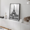 Black-and-white Eiffel Tower photo with a cyclist in the foreground, perfect for Paris wall art decor.